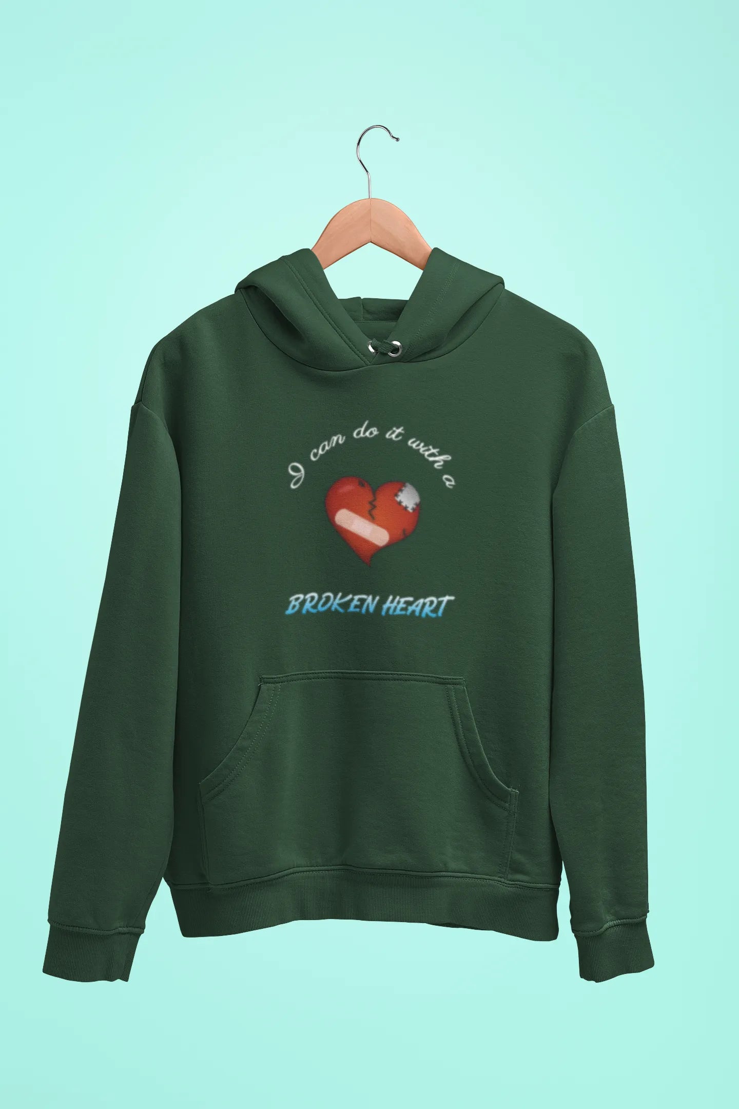 i can do it with a broken heart unisex hoodie green