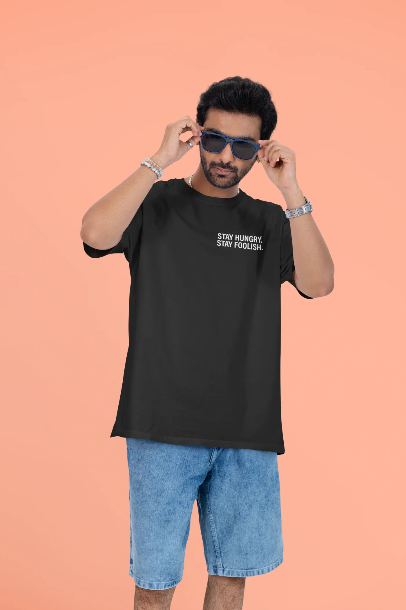 Blijf hongerig, blijf onbezonnen. Oversized T-shirt.